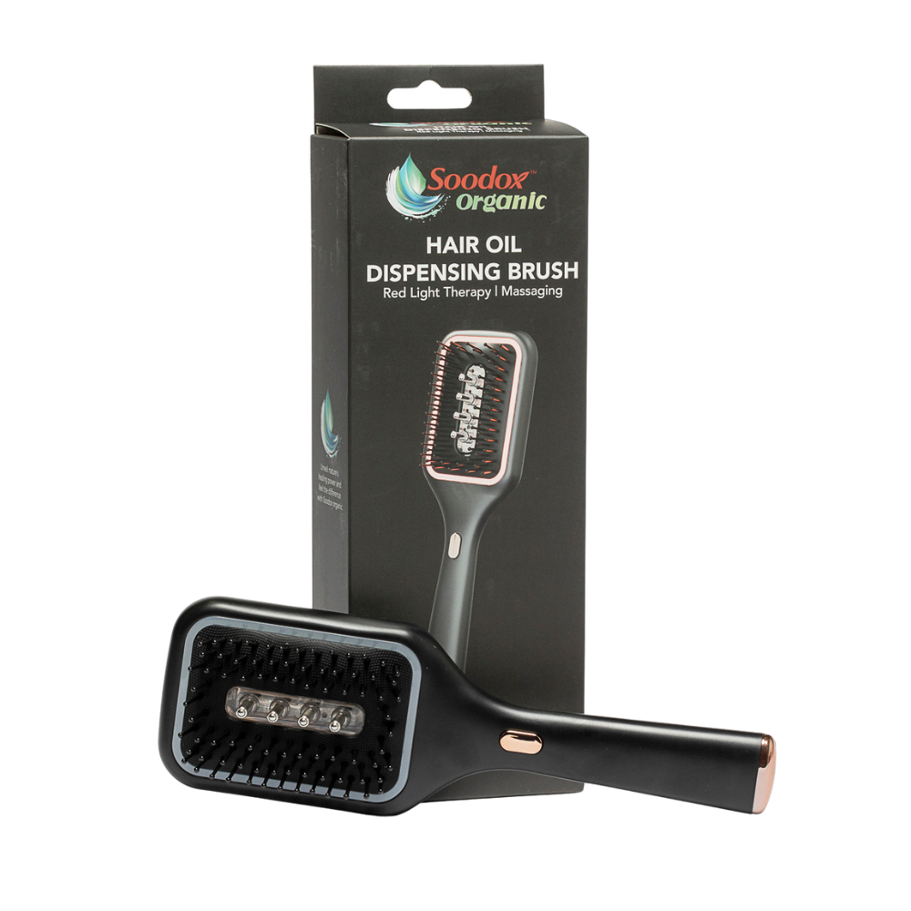Soodox Hair Oil Dispensing Brush box with black brush lying in front