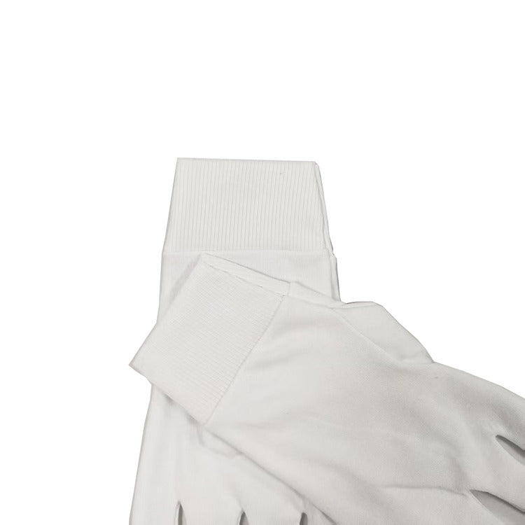 White cotton gloves folded at the cuff