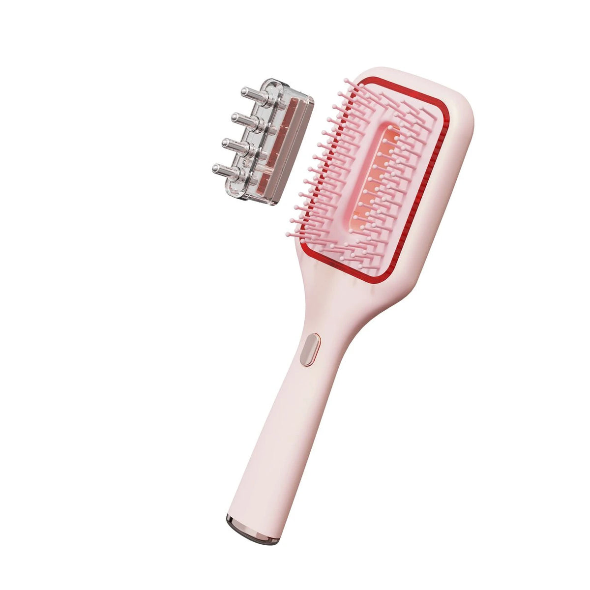 Pink oil-dispensing brush with removable oil reservoir lifted out
